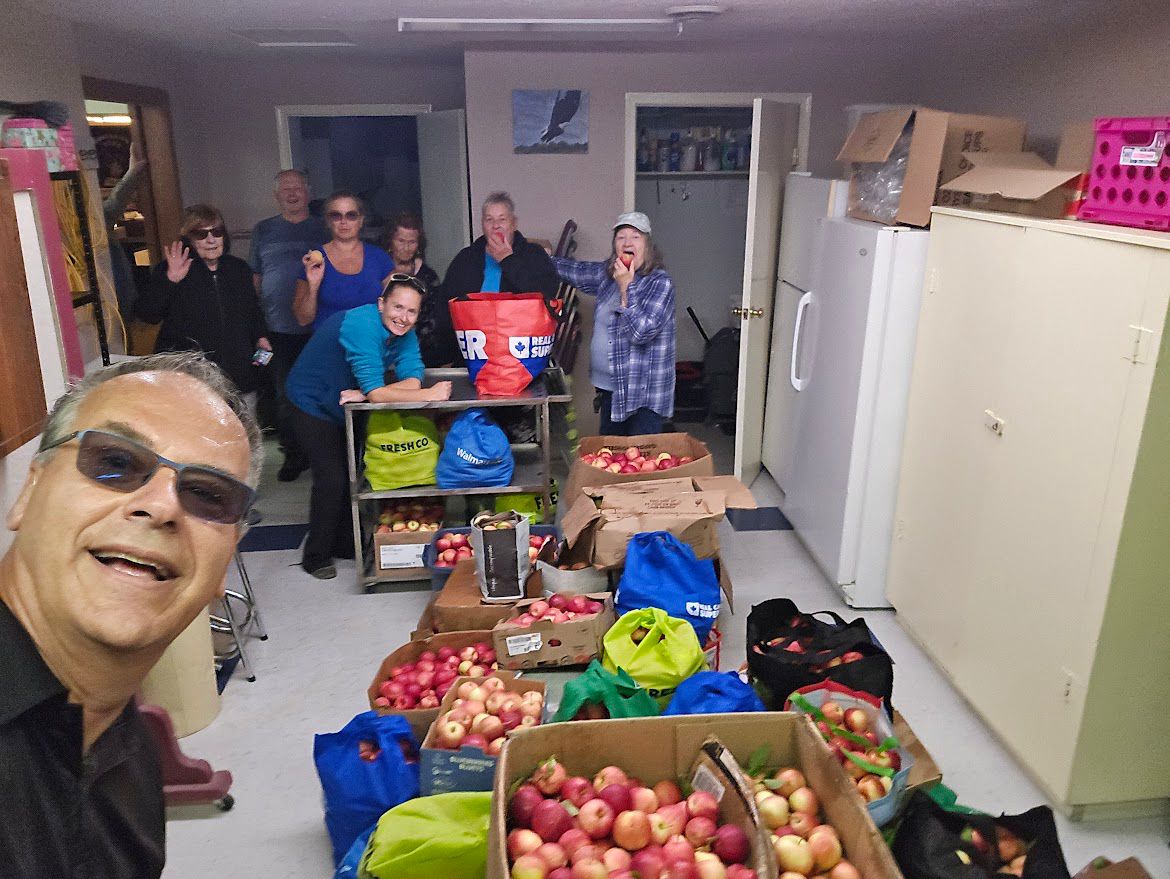 Sorting apples for the food bank