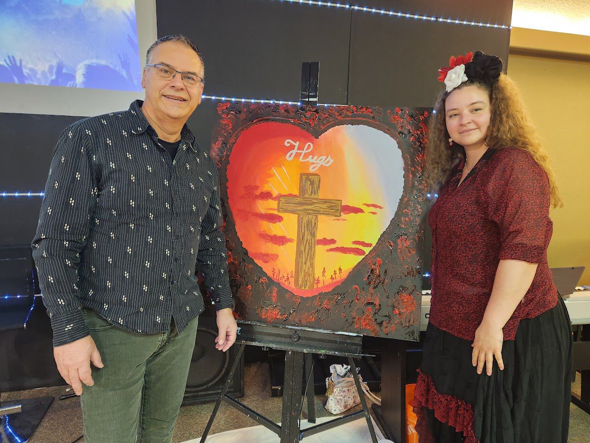Local artist and her painting of the cross